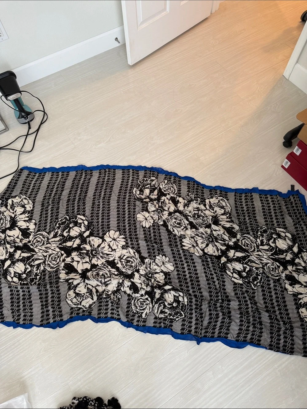 Stella & Dot Black and White Floral Sheer Scarf with Blue Edge.